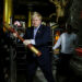 British Foreign Secretary Boris Johnson hits a bell while visiting Shwedagon Pagoda in Yangon. / Reuters