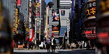 The head of Godzilla, a Japanese monster movie character, is seen on a building of Toho Cinema in Tokyo, Japan on February 18, 2019. / REUTERS 