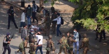 Regime soldiers, police and thugs beat and kick anti-regime protesters in Monywa, Sagaing Region, in February. / CJ