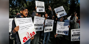 People shout slogans as they carry placards during a protest against a bill passed by India's lower house of parliament that aims to give citizenship to non-Muslims from neighboring countries, in New Delhi, India  on January 14, 2019. / REUTERS