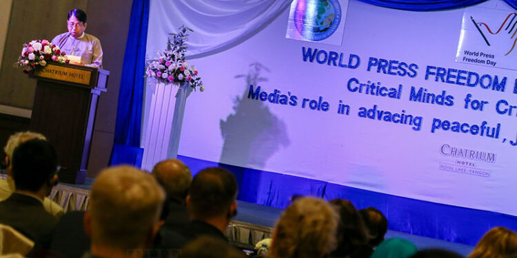 Information minister U Pe Myint speaks at a conference at the Chatrium Hotel in Rangoon on World Press Freedom Day / Naing Lin Soe / The Irrawaddy