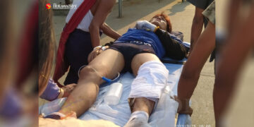 A protester injured after security forces opened fire on an anti-regime protest in Yangon’s Hlaing Tharyar Township is taken to hospital./ The Irrawaddy