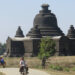 People drive past a stupa in Mrauk-U Township, Rakhine State. / Min Aung Khine / The Irrawaddy