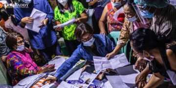 Administrators in Yangon conduct population surveys ahead of the COVID-19 vaccination program. / Htet Wai