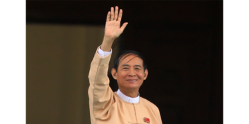 U Win Myint (center) arrives at the Union Parliament in Naypyitaw before being elected as president presidential on Wednesday. / Myo Min Soe / The Irrawaddy