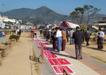 A protest against the Ta'ang National Liberation Army’s extortion on Dec. 19. / The Irrawaddy