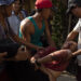 People carry Aung Kaung Htet after he was shot on Saturday in Yangon. / The Irrawaddy