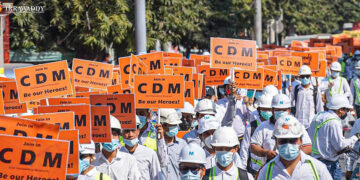 Anti-regime protesters urge civil servants to join the civil disobedience movement. / The Irrawaddy