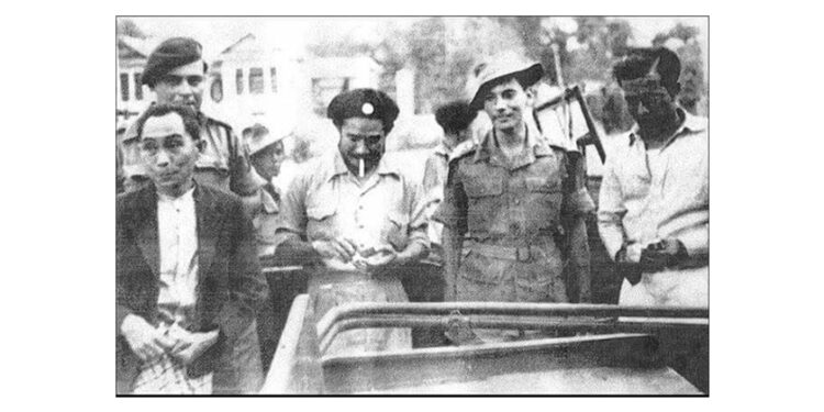 SAW BA U GYI leader of KNDO photographed on his emergence from embattled Insein to talk peace with the Union Government. On his left (BRIGADIER) DOUGLAS BLAKE of the Burma Army (1949)
