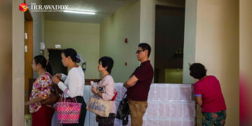 People queue at the East Yangon administration office to buy application forms for government land. / The Irrawaddy / Aung Kyaw Htet