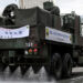 A decontamination truck disinfects Seoul’s Eunyeong district against the coronavirus on March 4, 2020. / Getty / Kyodo