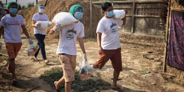 Right at the front Ko Zay Yar Tun along with other volunteers from Clean Yangon sending out food to families struggling during the coronavirus outbreak. / Clean Yangon / Facebook