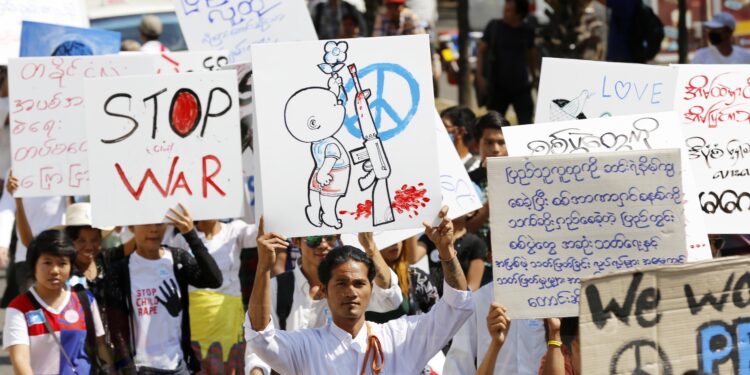 People take part in the Popular Movement for Peace march in Rangoon. / Myo Min Soe / The Irrawaddy