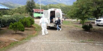 Health workers prepare to bring a quarantined person in Cikha to Tedim Hospital in Chin State after he tested positive for coronavirus. / IPRD Cikha