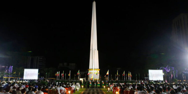 An Independence Day flag-hoisting ceremony is held in Maha Bandula Park in Yangon, the former capital.