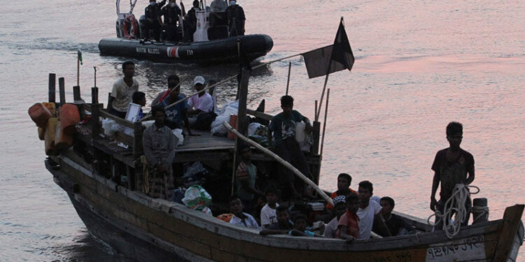 Rohingya refugees on a boat near the coast of Malaysia in April 2018. / Reuters