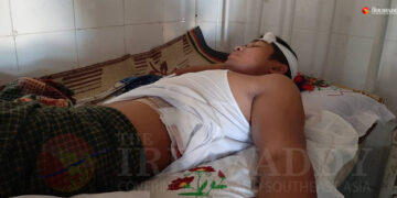 Ko Ne Hsan Win is treated at Sittwe Public Hospital on Oct. 15, 2019. / Min Aung Khine / The Irrawaddy