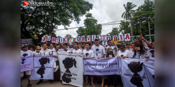 Hundreds of people join the ‘Justice for Victoria’ rally in July 2019 in Yangon to demand that authorities take decisive action in the case. The protesters gathered in front of the Criminal Investigation Department to show their lack of confidence in the police's handling of the case. / Aung Kyaw Htet / The Irrawaddy