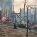 Ta Kan Thar Village in Shwebo Township, Sagaing Region is seen in flames after a regime raid on Monday. / Khit Thit