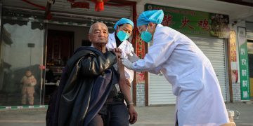 China Says Tracking COVID Cases Now ‘Impossible’ as Infections Soar