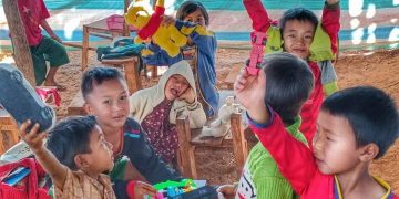 Myanmar Children Treasure Toys Amid Bombs and Bullets