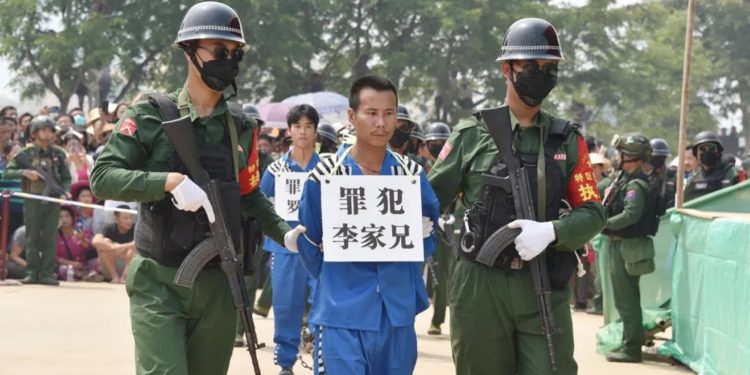 MNDAA escorts prisoners at a public trial Kokang’s capital Laukkai on April 24, 2024.