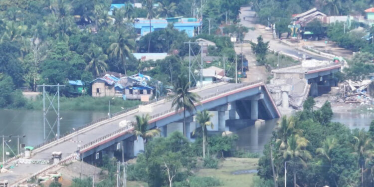 The bridge at the entrance to Buthidaung town after being blown up by junta troops in Rakhine State on Monday. / Arakan Princess Media