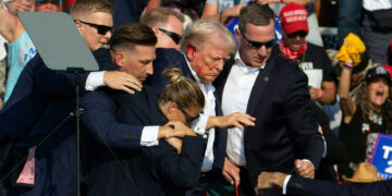 Bloodied Trump survives assassination attempt