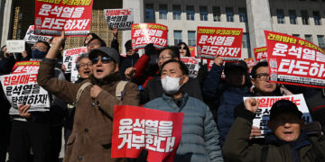 South Korean President Pressed to Resign Over Martial Law Bid