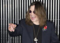 British singer Ozzy Osbourne poses for pictures as he arrives for the 2014 MTV Europe Music Awards (EMA) in Glasgow, Scotland on Nov. 9, 2014. / AFP