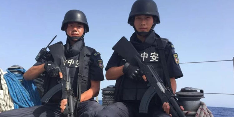 Two members of Chinese private security contractor Hua Xin Zhong An's maritime protection service. Photo via Hua Xin Zhong An's WeChat account.